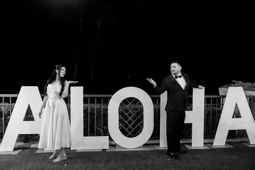 Aloha wedding text logo in white letters for Hawaii destination weddings